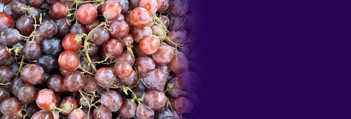Close up of raw organic sweet red grapes background, wine grapes texture, Healthy fruits Red wine grapes background, top view