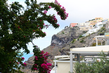 SANTORINI,GREECE-June 20 2023: Oia village, the most picturesque village on Santorini island, a...