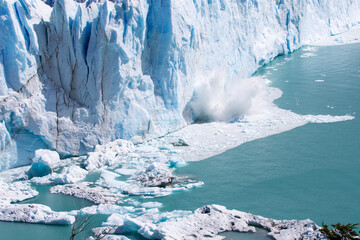 Ice calving from the terminus of the Perito Moreno Glacier in Los Glaciares National Park, Santa...
