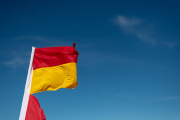 flag ocean swimming