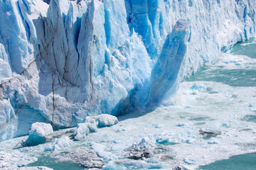 Ice calving from the terminus of the Perito Moreno Glacier in Los Glaciares National Park, Santa...
