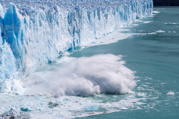 Ice calving from the terminus of the Perito Moreno Glacier in Los Glaciares National Park, Santa...