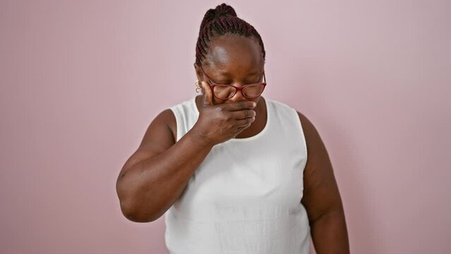 Sneezing african american woman with braids, in glasses and plus size, over pink isolated background, sick from springtime pollen, seasonal allergy nightmare!