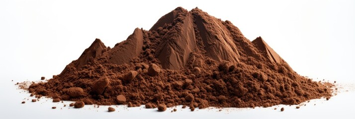 A mound of fine cocoa powder shaped like a mountain