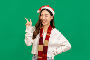 Happy smiling asian woman holding gift box over green background.