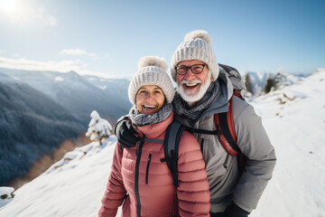 Fototapeta na wymiar Cheerful mature active smiling mature couple enjoying time in winter cold mountains, happily retired. Romantic elderly still in love lifestyle time spending, family good relationship concept