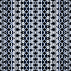 Seamless monochrome ethnic ikat pattern. Black ornament on a light gray background.
