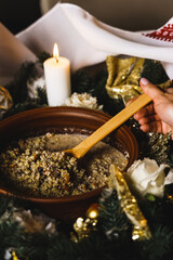 Kutia on the Christmas table. Kutia preparation. Christmas concept. Festive Christmas dinner. Ukrainian cuisine