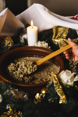 Kutia on the Christmas table. Kutia preparation. Christmas concept. Festive Christmas dinner. Ukrainian cuisine