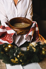 Kutia on the Christmas table. Kutia preparation. Christmas concept. Festive Christmas dinner. Ukrainian cuisine