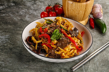 Asian wok with noodle, vegetables and beef