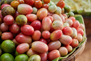 Heap of ripe tomatoes in basket