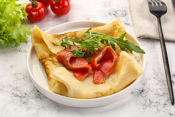 Russian pancake with salmon fish