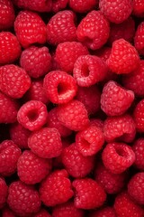 Vibrant close-up of fresh raspberries with natural shadows. Summer berry harvest. High-resolution texture. Perfect for banner, culinary backgrounds, or design