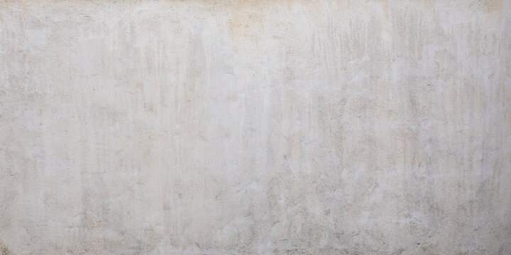 Abstract old stained and dusty Panorama concrete white marble old grey wall cement light background facade