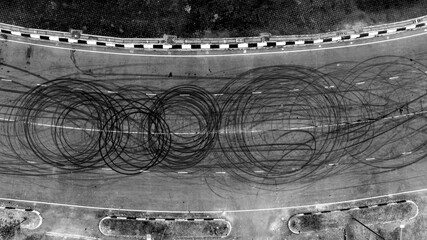Aerial top view car tire marks burnout, Tire marks on the asphalt road, Tire mark on race track...