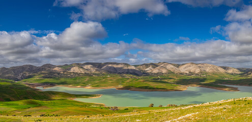 Scenic Beauty of Kasseb Dam: A Majestic View of Mountains and Lake in Bousalem, Beja, Tunisia, North Africa