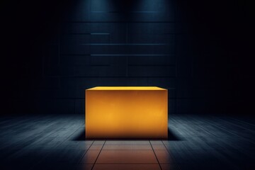  a yellow box sitting in the middle of a room with a light at the end of the box on the floor.