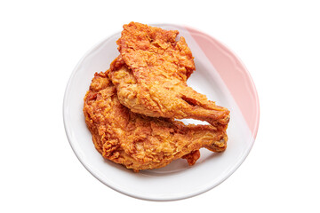 2 large chicken thighs batter and deep fried in plate isolated on white background. fried chicken is a dish consisting of chicken pieces that have been coated with seasoned flour or batter.