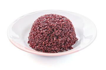 Cooked riceberry in a white plate isolated on white background. Riceberry rice is dark purple rice similar to ripe berries, rich in nutrients and has good anti-oxidant properties.