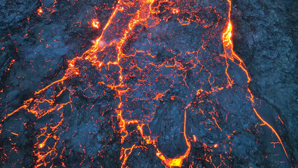 Aerial view over volcanic eruption, Night view, lava spill out of the crater ( Iceland)