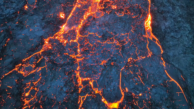 Aerial view over volcanic eruption, Night view, lava spill out of the crater ( Iceland)