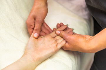 bride and groom holding hands