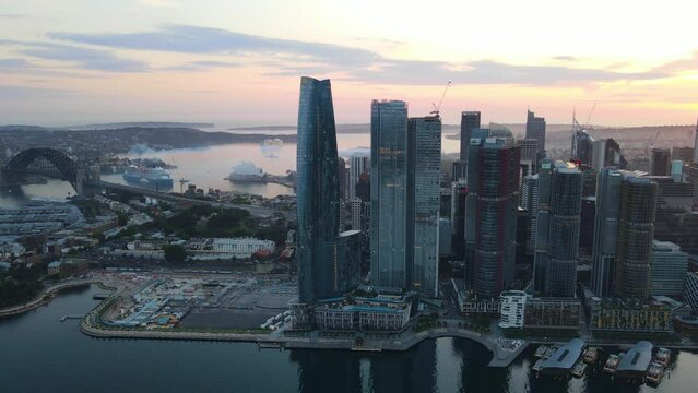 Aerial drone view of Barangaroo waterfront precinct in Sydney City, NSW Australia during a morning sunrise in December 2023