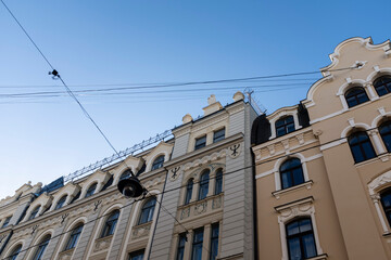 Fototapeta na wymiar Beautiful and well preserved art nouveau modernist buildings in a beautiful street in Riga, Latvia