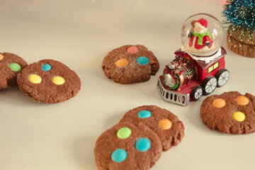 Homemade shortbread cookies with candies for the New Year. Statuette with Santa Claus.
