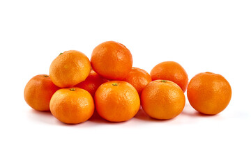 Ripe tangerine fruits, isolated on a white background.