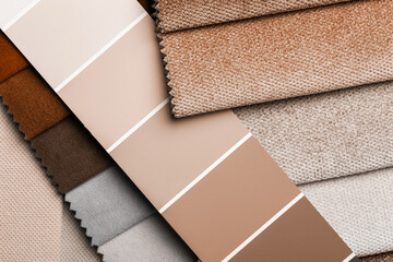 a variety of fabrics with a color palette. New trending PANTONE Peach Fuzz colour of 2024 year - 690565461