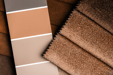 a variety of fabrics with a color palette. New trending PANTONE Peach Fuzz colour of 2024 year - 690565490