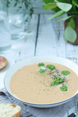 A bowl with mushroom cream soup
