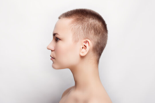 Beauty portrait of young girl profile with short hair