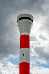 Red and white Blankenese lighthouse near Hamburg. Historic lighthouse on the Elbe at the...