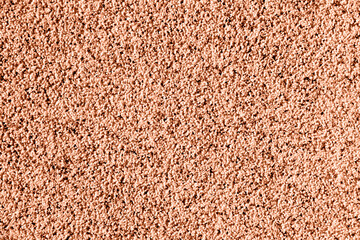 Decorative plaster. Peach Fuzz color.