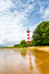 Wittenbergen lighthouse on the Rissener Ufer near Hamburg. Historic lighthouse on the Elbe. Lighthouse Rissen, lower light.