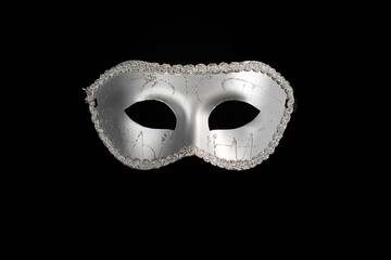 Carnival mask, an elegant masquerade accessory for a cabaret show, black background