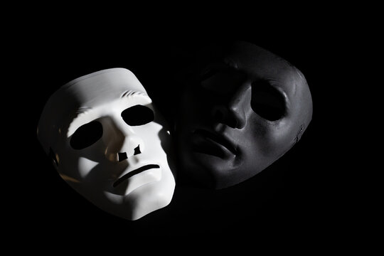 Black and white mask, good and evil, truth and lies, split personality, schizophrenia,