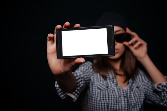 Hipster girl taking picture smartphone self-portrait, screen view