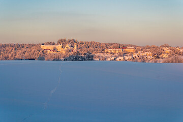 Fototapeta na wymiar Snowy and beautiful winter landscape in Wolfegg in Upper Swabia
