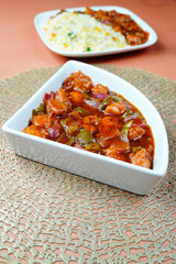 Chicken gravy serve with Chinese Fried rice. Shashlik chicken with rice. egg fries rice
