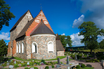 Old cathedral, now just a parish church in Gamla Uppsala, Sweden - obrazy, fototapety, plakaty