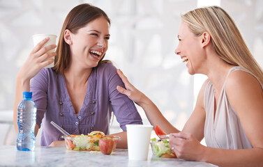 Laughing, colleagues or friends at lunch in cafeteria with funny conversation, smile and eating....