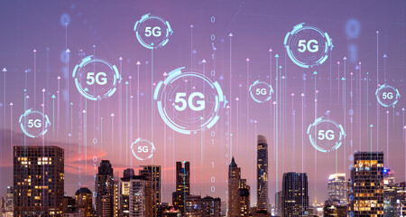 5G signs in evening city sky