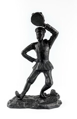 The statuette "Soldier dancing with a tambourine" purchased (by the consumer) from cast iron in close-up on a white background