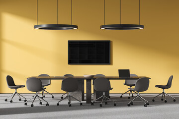 Yellow meeting room interior with table and chairs, tv screen and laptop - obrazy, fototapety, plakaty
