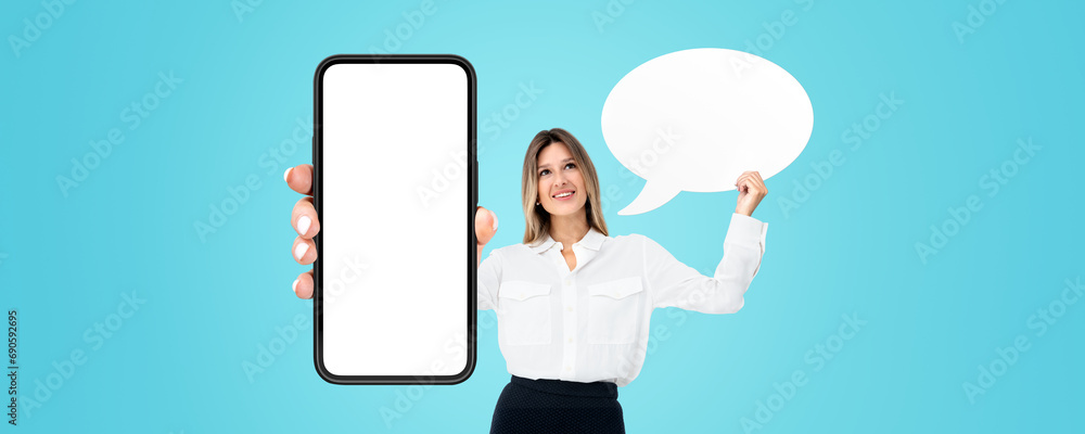 Poster smiling woman showing smartphone with mock up display and empty thought bubble