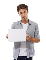 Portrait, sign and man on poster, advertising and mockup space isolated on a white studio background. Serious face, paper and show banner for promotion, info or commercial, marketing or presentation